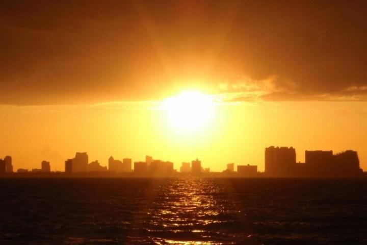 a sunset over a body of water